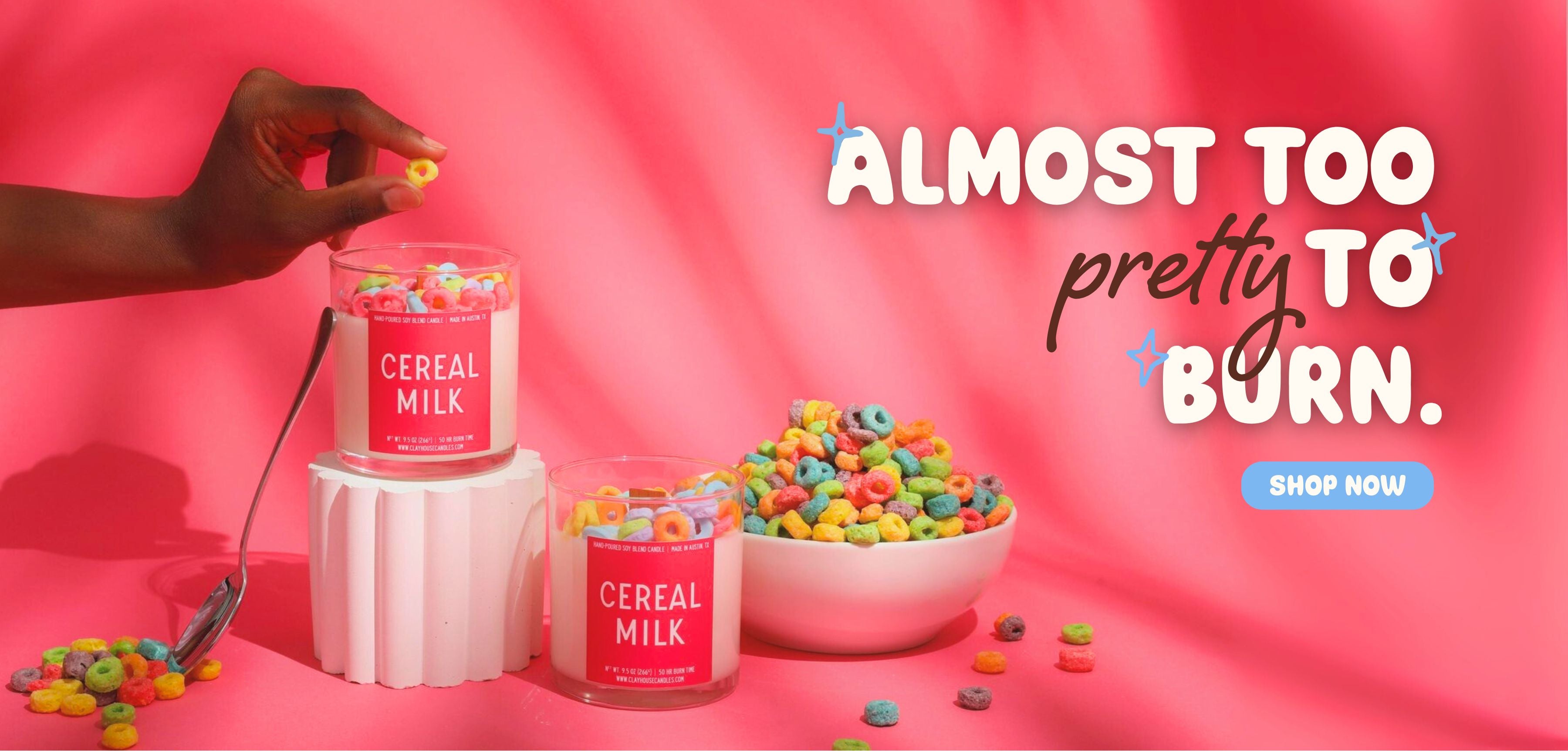 Cereal-themed product with colorful cereal and a pink background